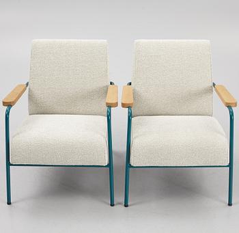 Jean Prouvé, a pair of "Fauteuil de Salon" armchairs, Vitra.