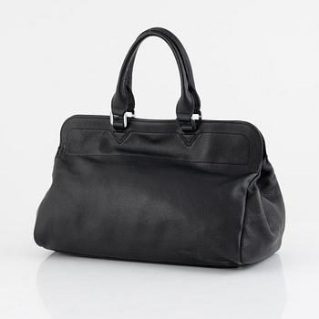 Longchamp, A black leather bag.