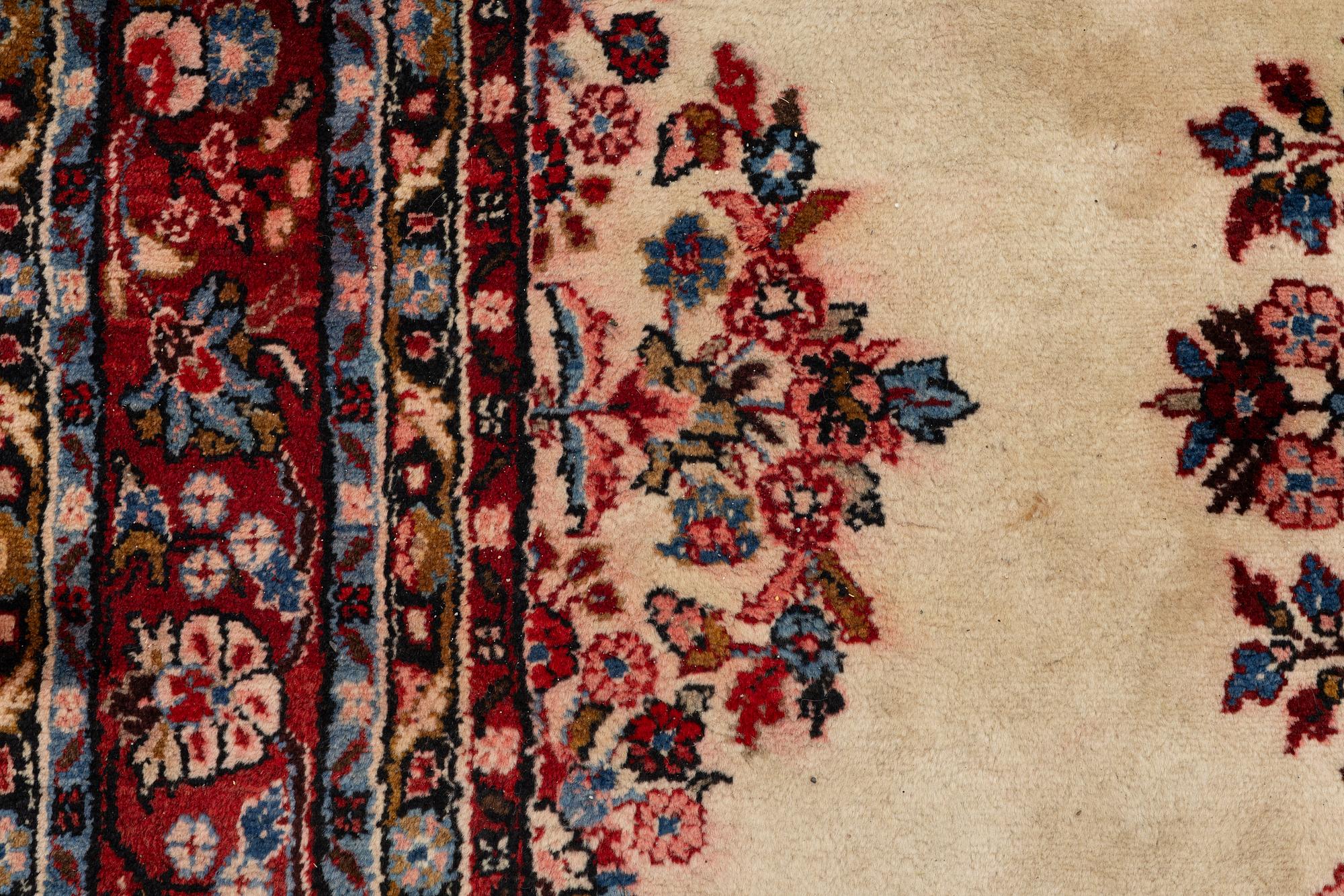 An oriental carpet, c. 370x260 cm.