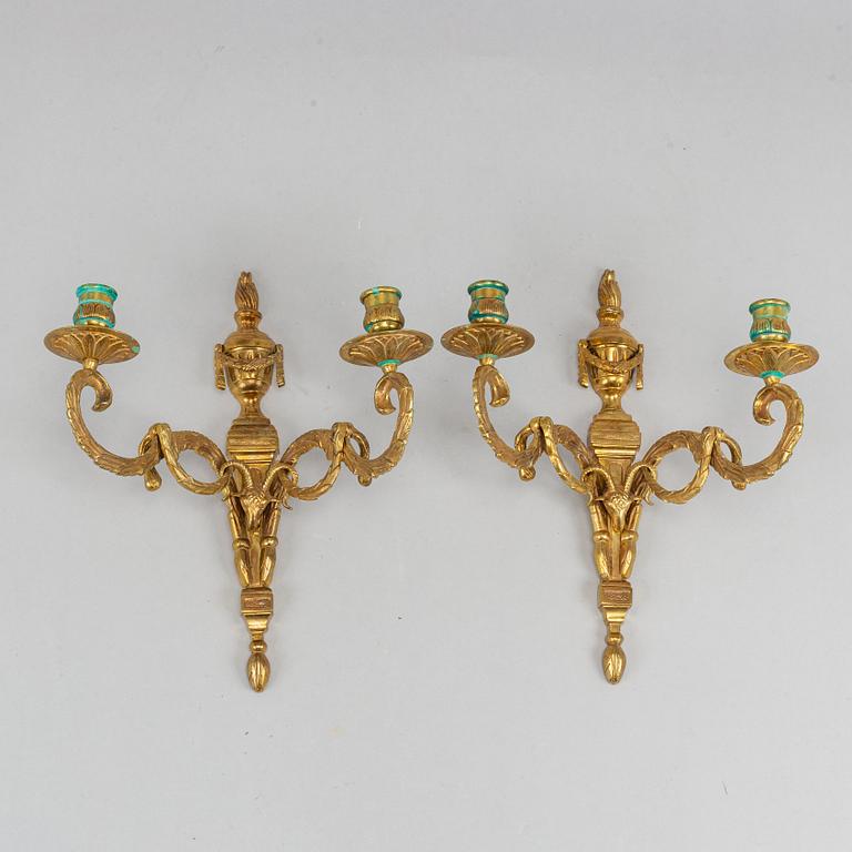 A pair of wall sconces, Louis XVI style, early 20th century.