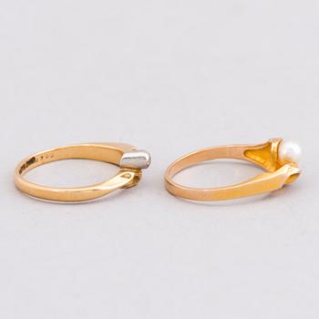 TWO BJÖRN WECKSTRÖM RINGS, pearl, diamond, 14K and 18K gold. Lapponia 1979-82.