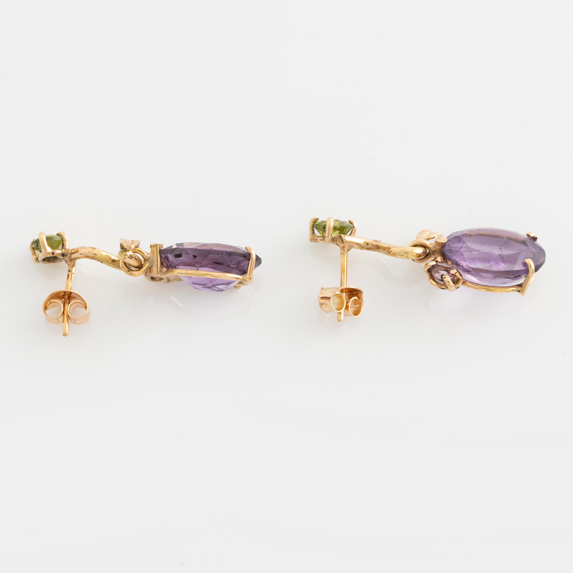 Earrings with oval amethysts, peridot, tourmaline, and small diamonds.