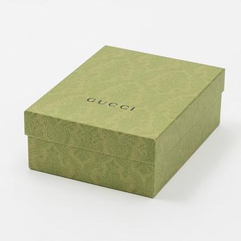 Gucci, a 'Flora' twill silk scarf.