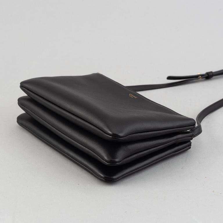 Céline, a black leather 'Trio Bag'.