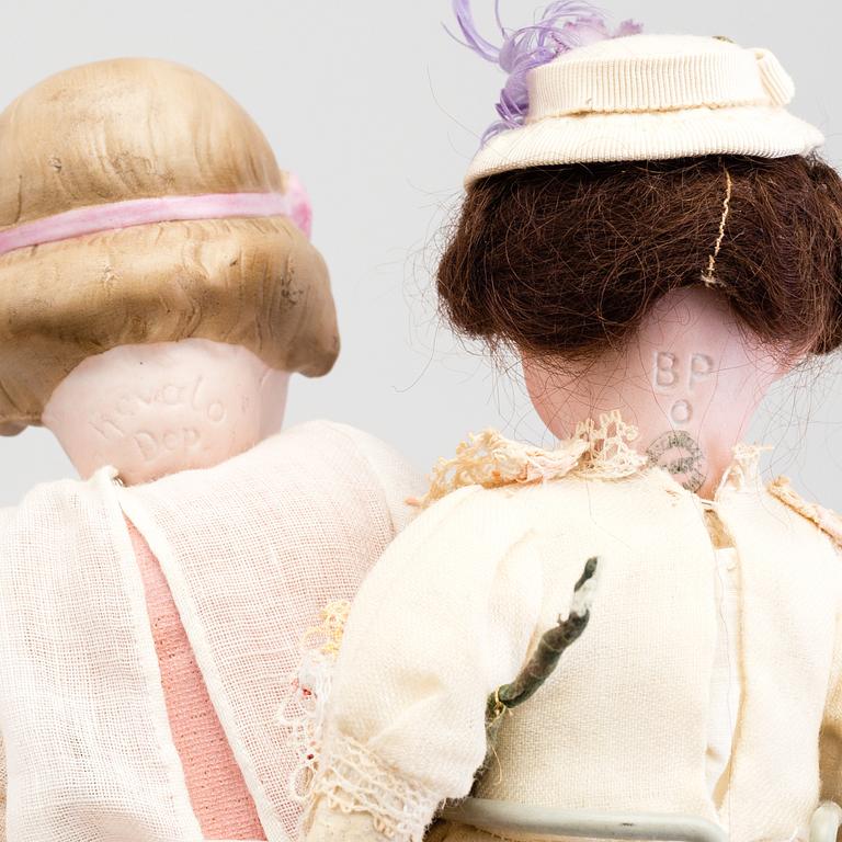 Five 20th century dolls, one Revalo.