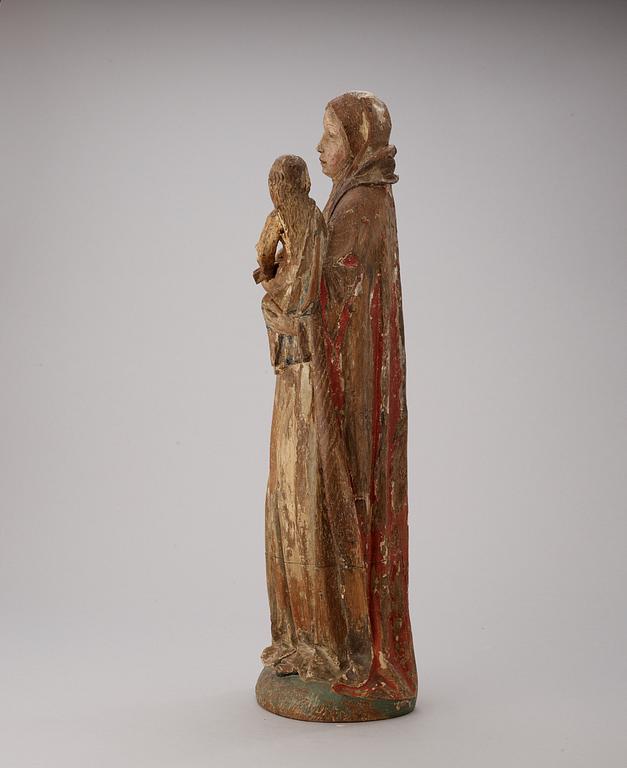 A late Gothic wooden sculpture of Anna selbdritt, presumably 16th century.