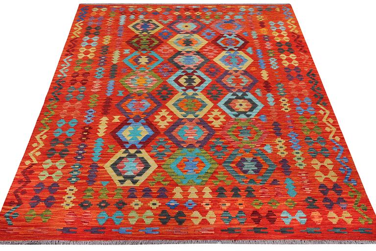 A Kilim carpet, c. 292 x 203 cm.