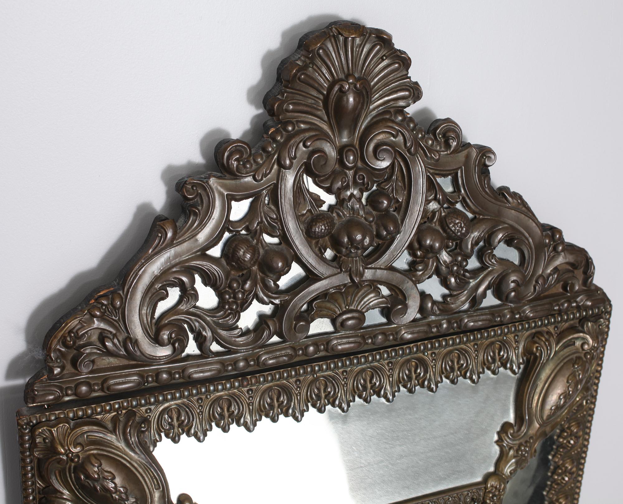 A baroque style mirror, late 19th century.