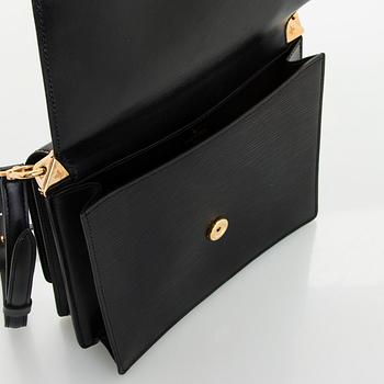 Louis Vuitton, a 'Grenelle' bag.