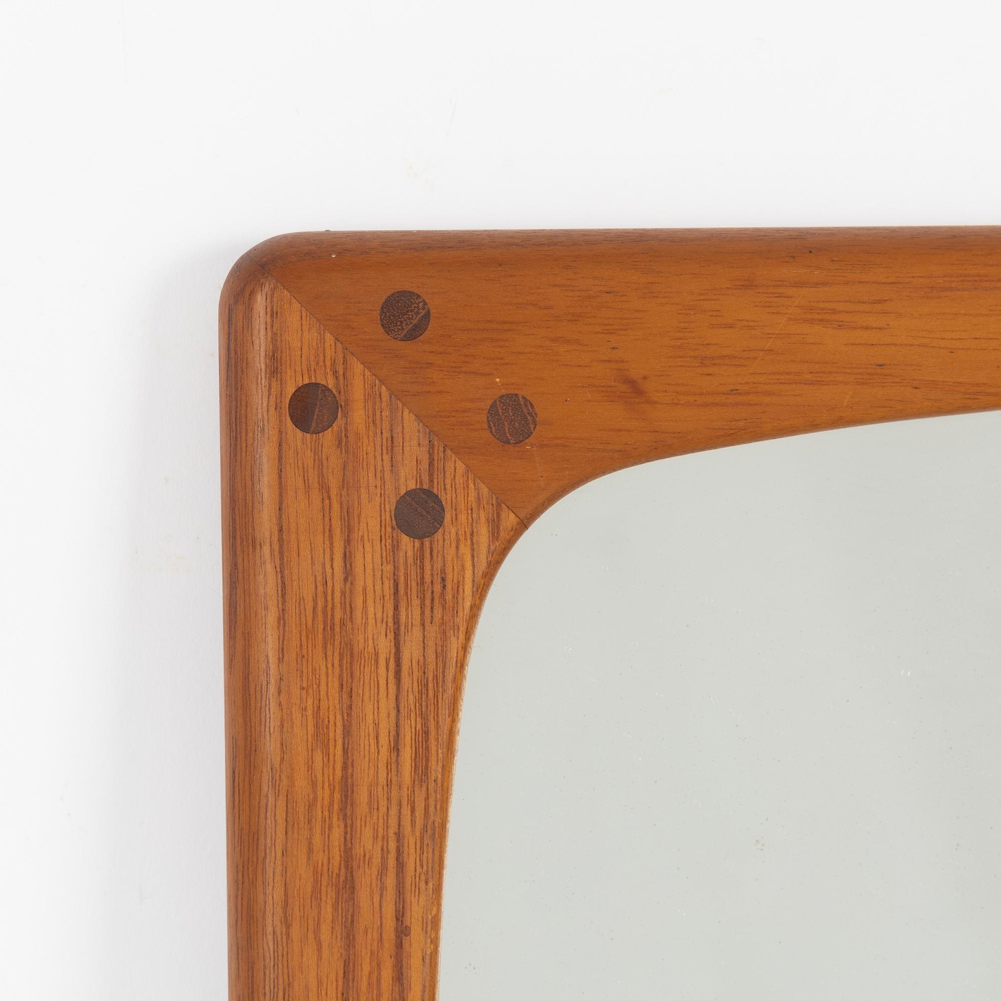 A dresser with mirror, Denmark. 1960s.