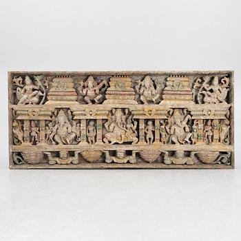 A sculptured wooden panel, India,  circa 1900.