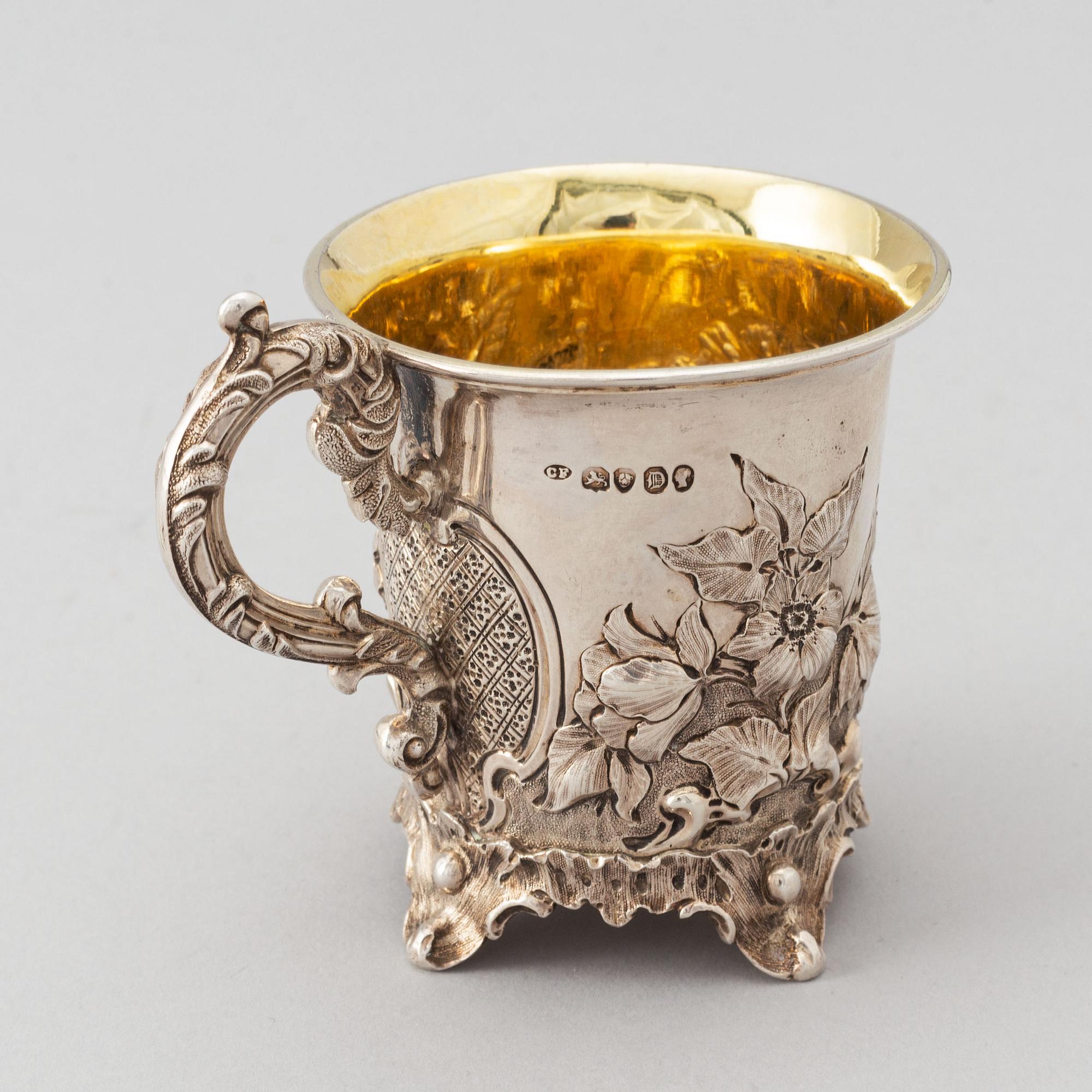 A parcel-gilt Rococo Revival silver jug, mark of Charles Fox II, London 1839.