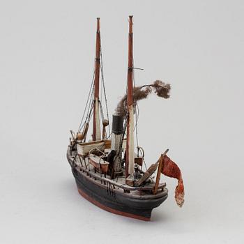 A 20th century wooden model of a steam engine boat.