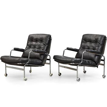 19. Bruno Mathsson, a pair of "Karin" easy chairs, DUX, Sweden, post 1969.