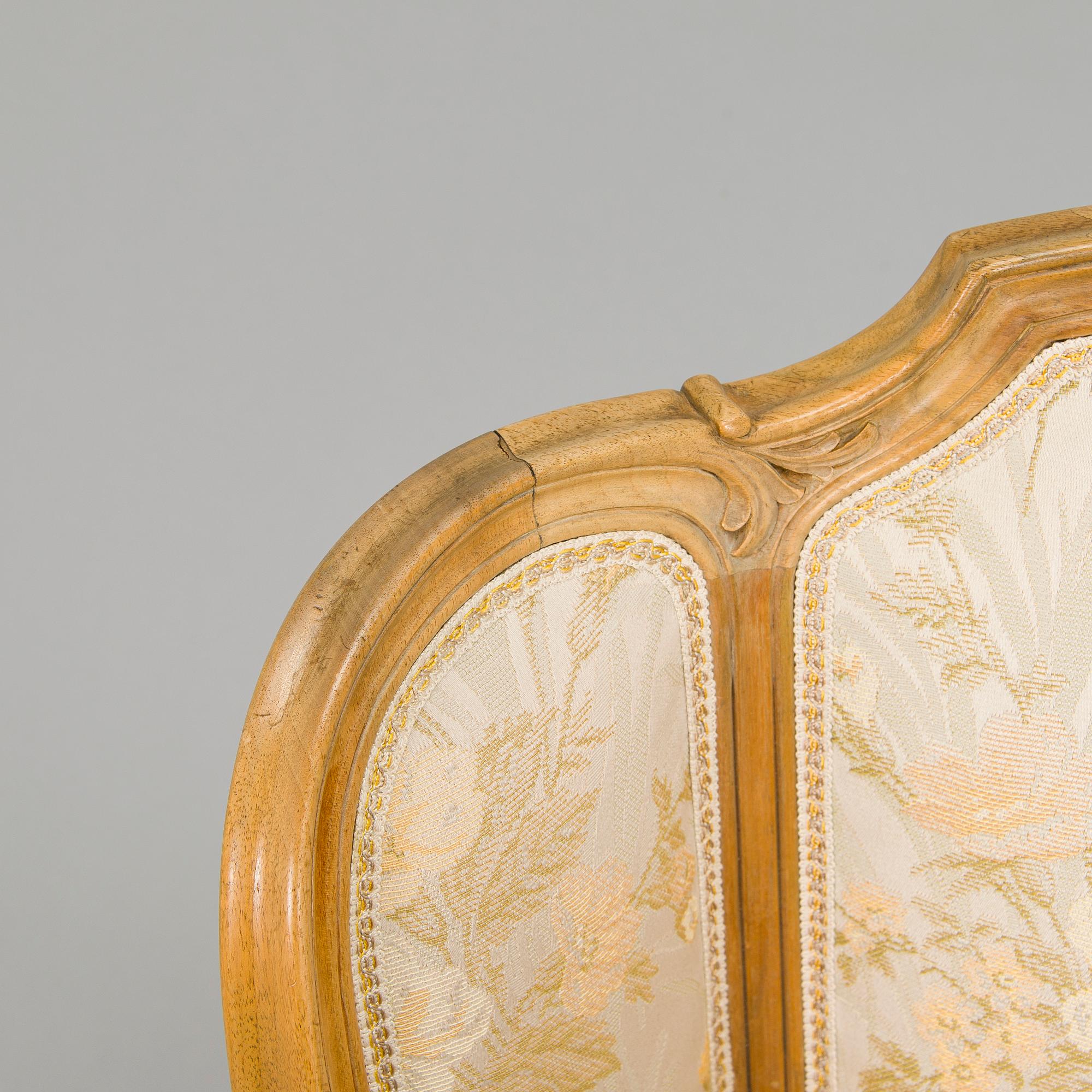 A pair of mid-20th-century French armchairs in Roccoco style.