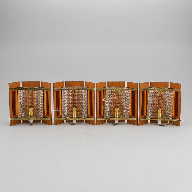 Four 1960/70's wall lights.