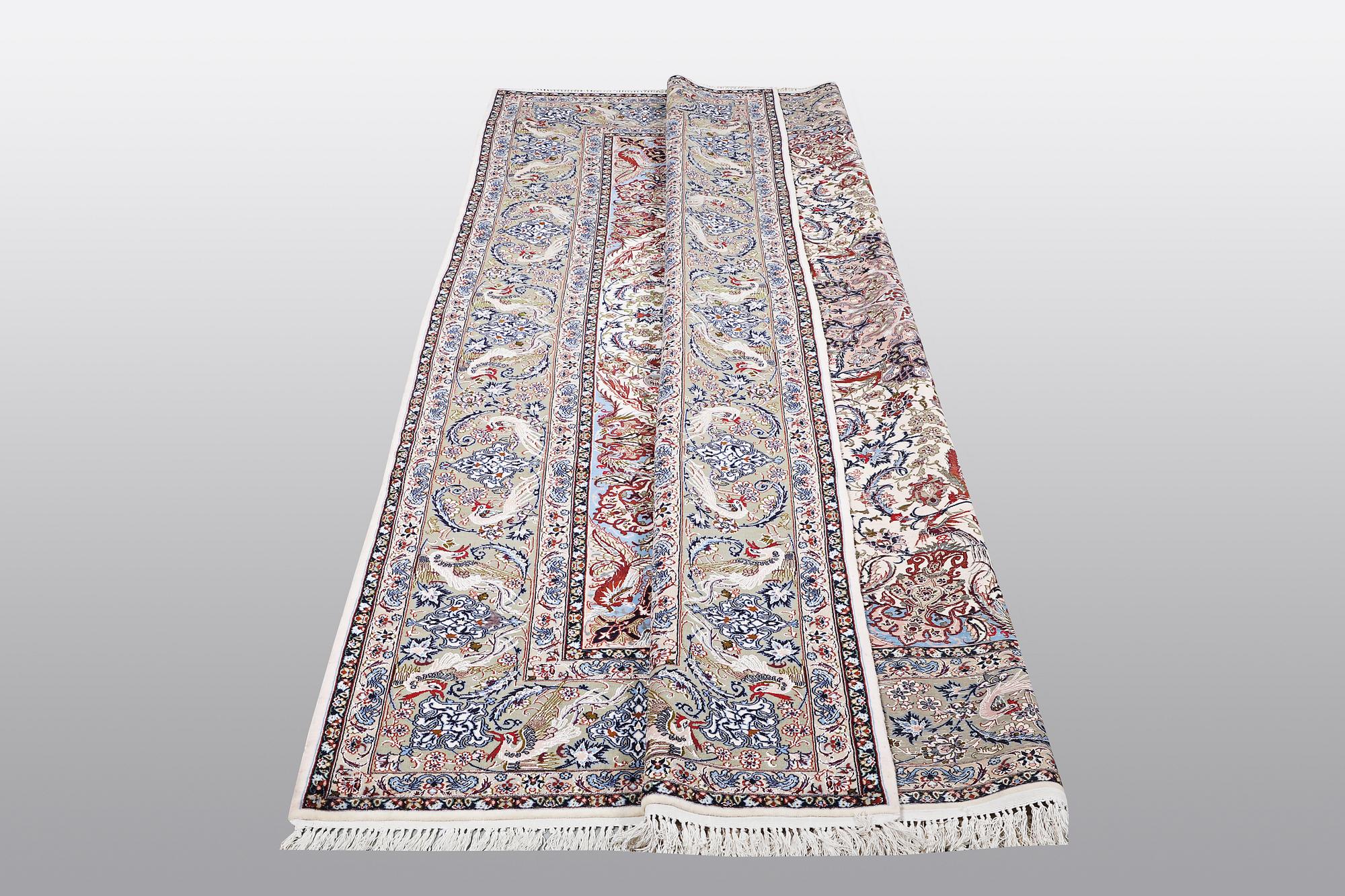 A carpet, Old Esfahan, part silk, ca 308 x 202 cm.