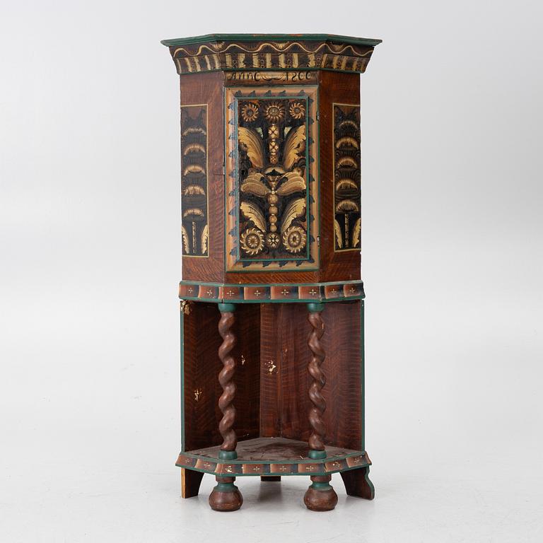 Corner cabinet, dated 1800.