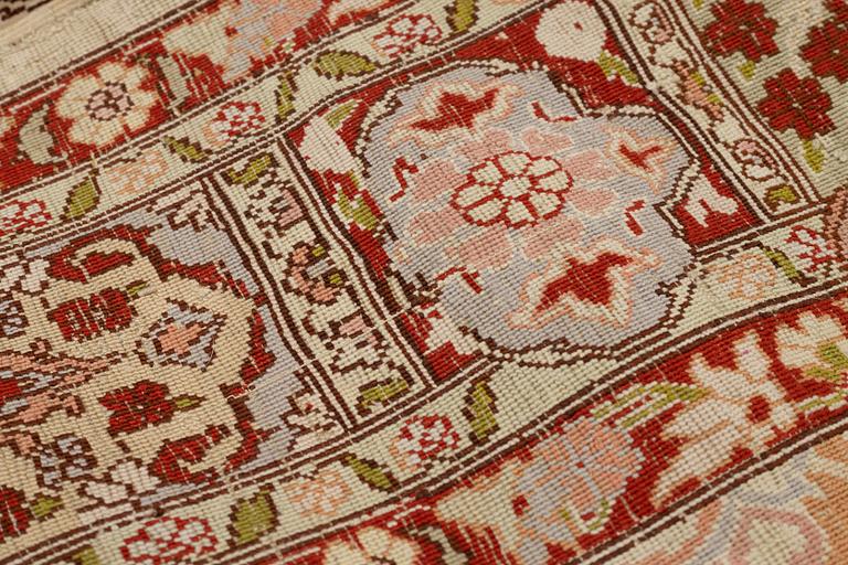 A rug, Old silk Hereke, ca 152 x 110 cm.