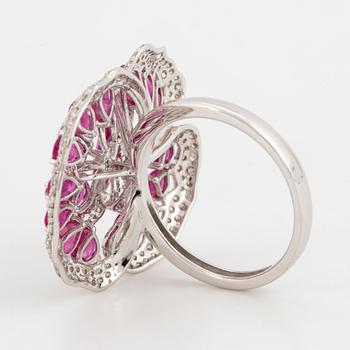 Ruby and brilliant-cut diamond flower ring.