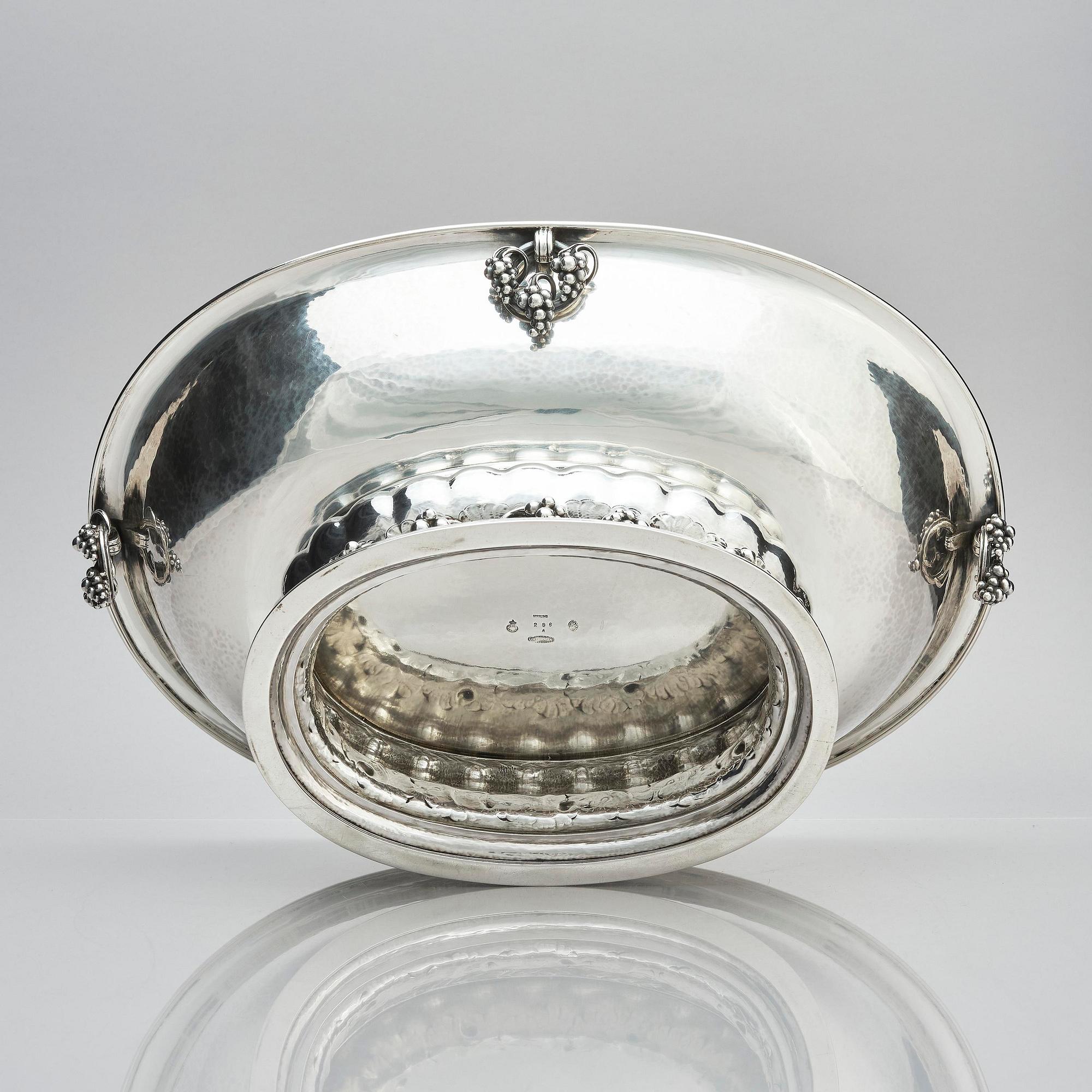 Georg Jensen, an 830/1000 silver centerpiece with grapes, Copenhagen 1925-32, design nr 296A from 1919.
