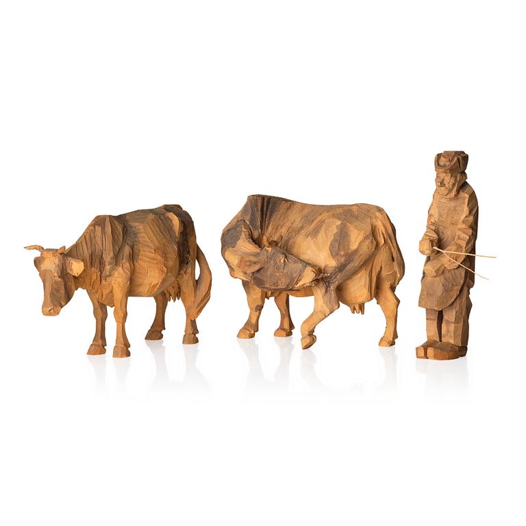 Axel Petersson Döderhultarn, Two cows and a man with prod.
