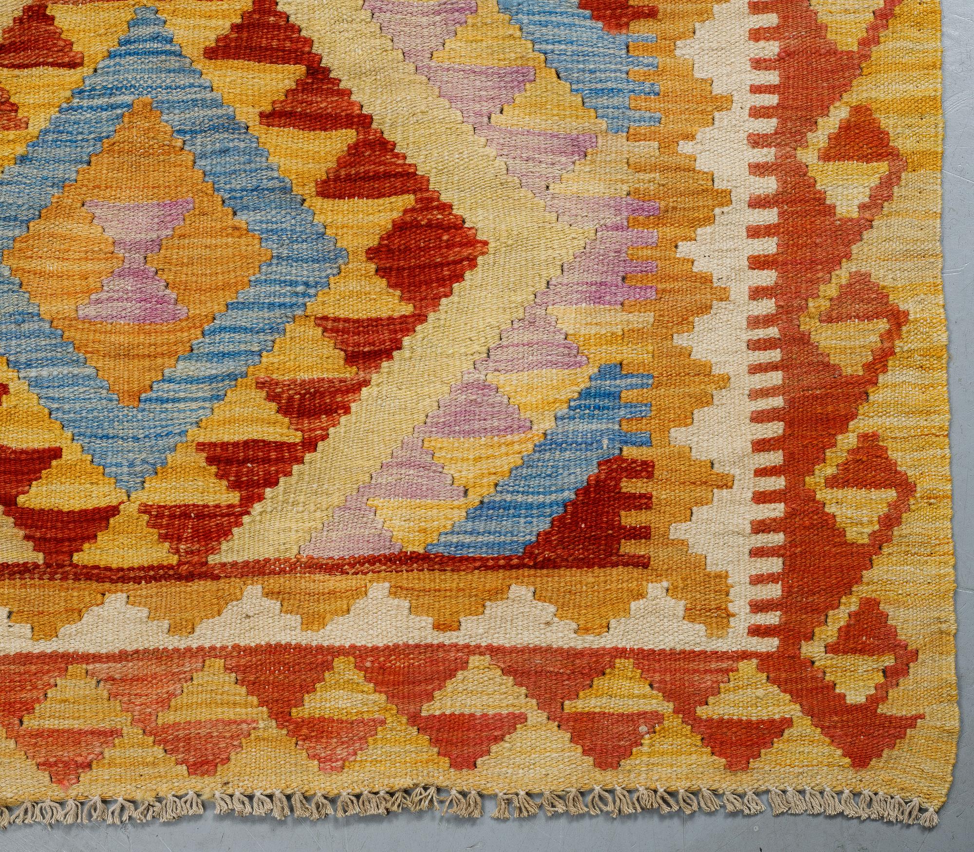 A rug, kilim, ca 248 x 181 cm.