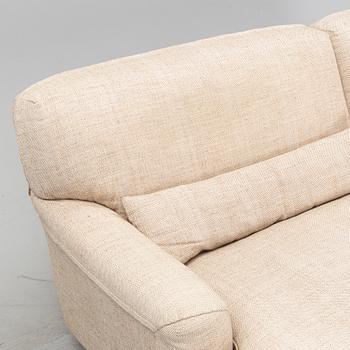 A 'Raffles' sofa designed by Vico Magistretti in 1988 for DePadova.