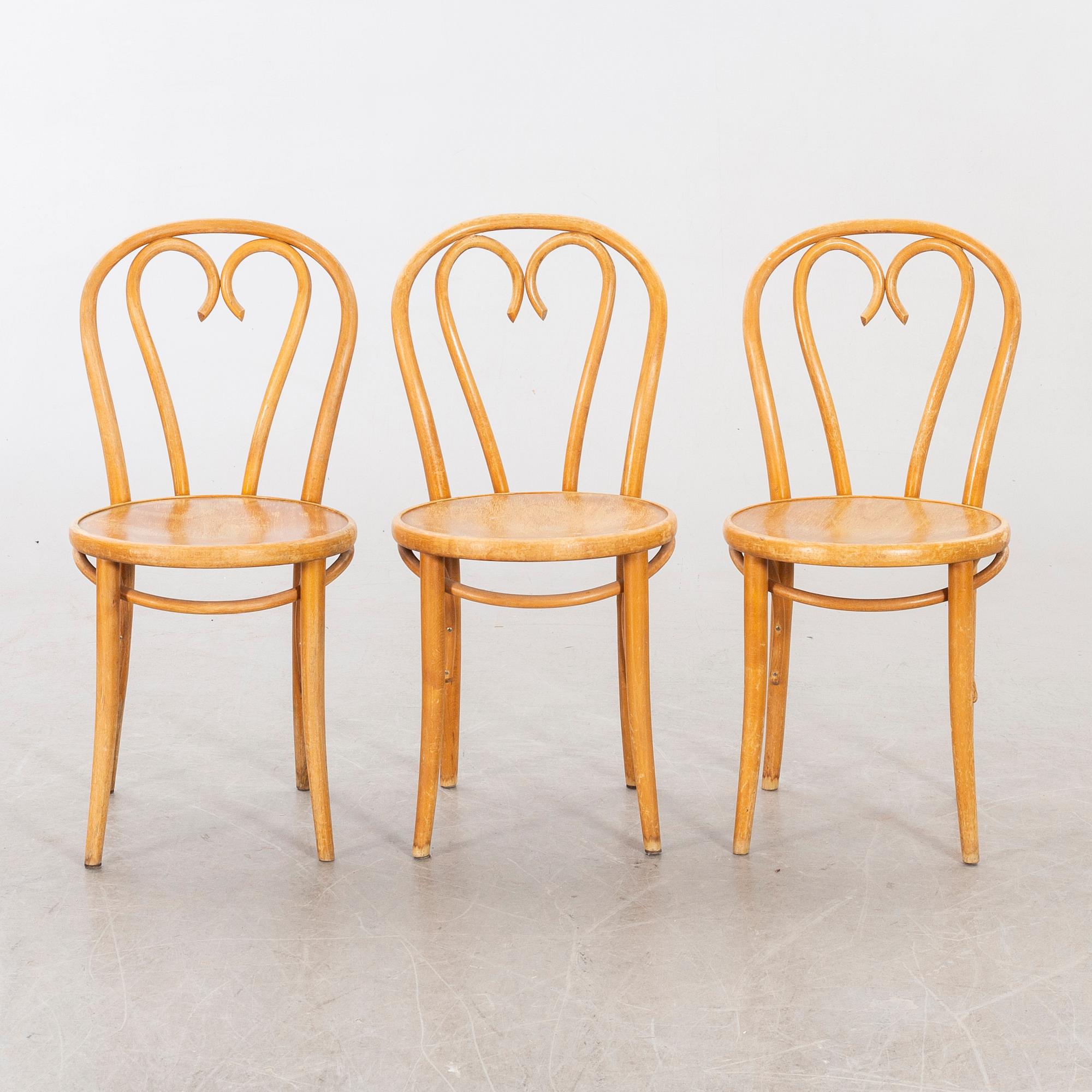 A SET OF SIX BENTWOOD CHAIRS.