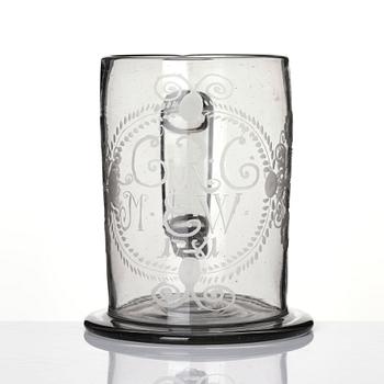 A large tankard, 18th Century with eched monogram for 'G.R.G' and 'M.E.W.' 1781.