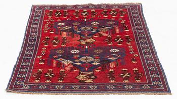 A carpet, circa 133 x 93 cm.