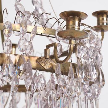 A Late Gustavian gilt brass and cut glass eight-light chandelier, circa 1800.
