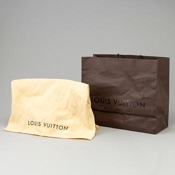 A Louis Vuitton "Alma Epi" handbag.