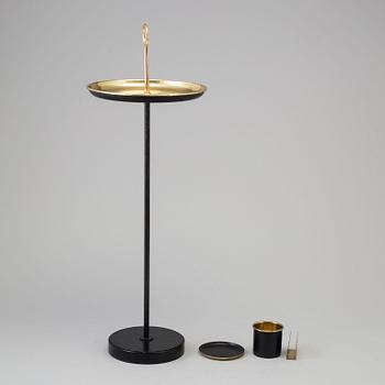 GUNNAR ANDER, a brass and iron table from Ystad-Metall, mid 20th Century.