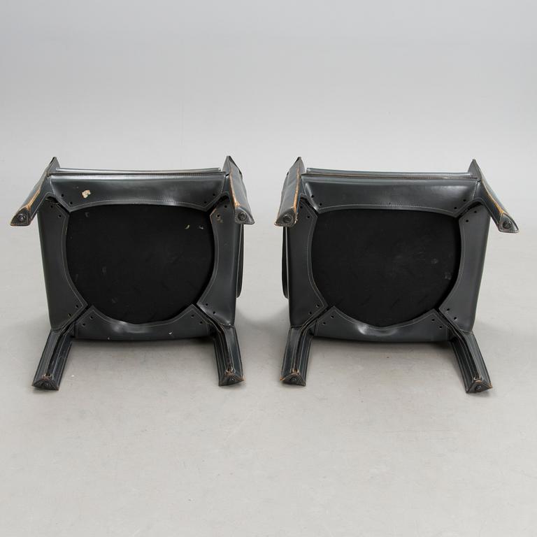 A pair late 20th century '414 Cab' chairs by Cassina, Italy.