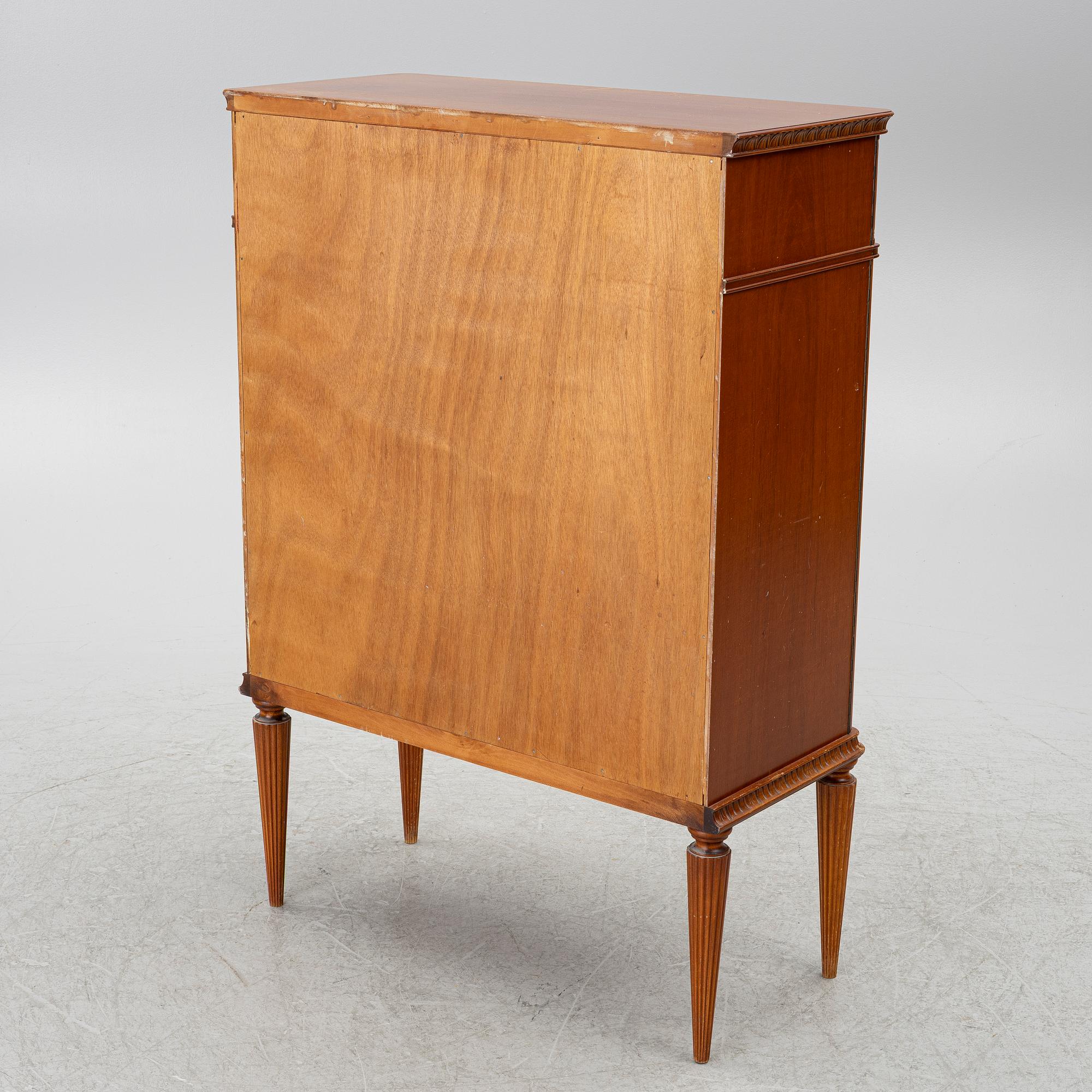 A cabinet, around the mid-20th century.