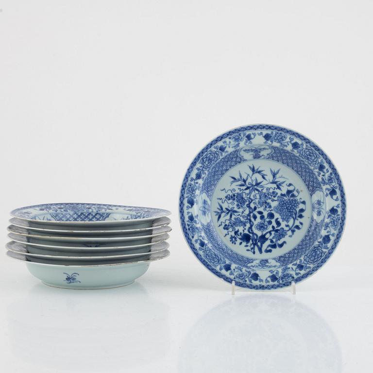A set of seven Chinese blue and white soup dishes, porcelain. Qing dynasty, 18th century.