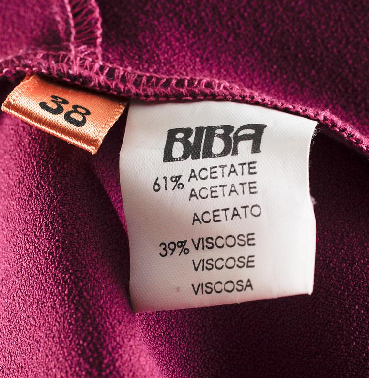 A plum-coloured jumpsiut by Biba.