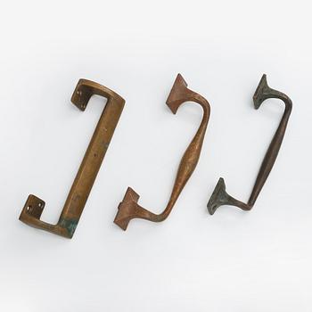 Door handles, three pieces, ca 1900 and 1960s.