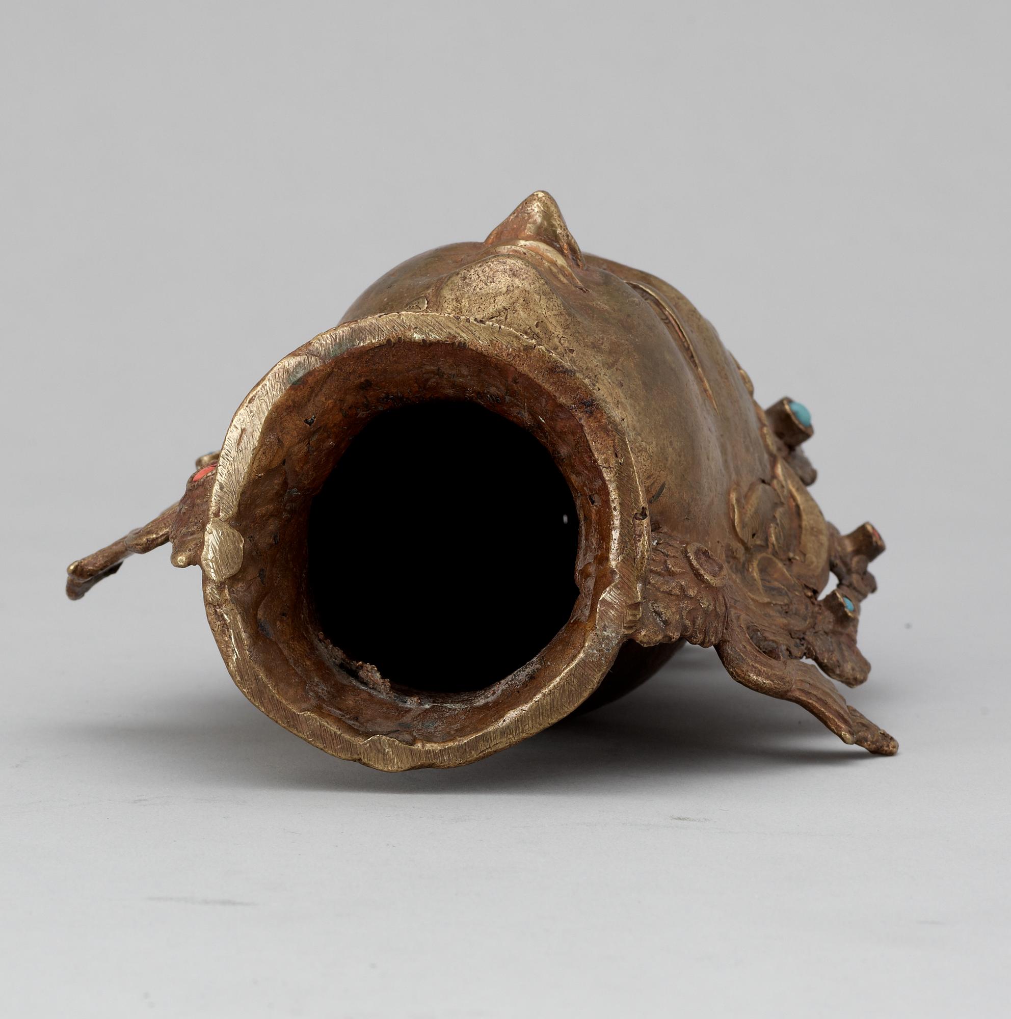 BUDDAHUVUD, brons med stenar. Troligen Nepal.