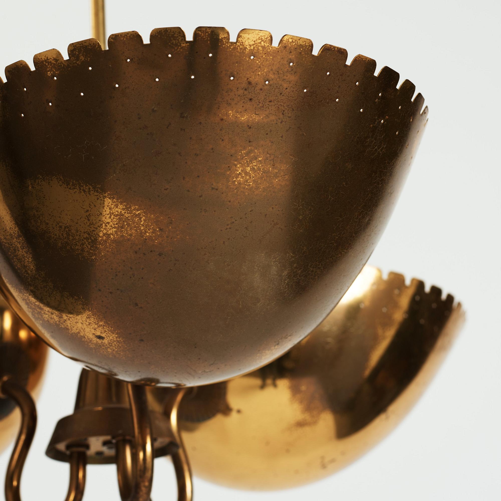 Carl-Axel Acking, probably, a Swedish Modern three light brass ceiling light, Arvid Böhlmarks Lampfabrik, 1940's.