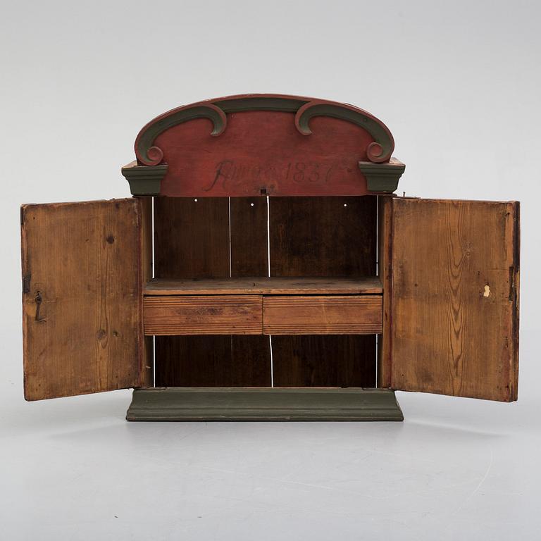 An 1837 cabinet.