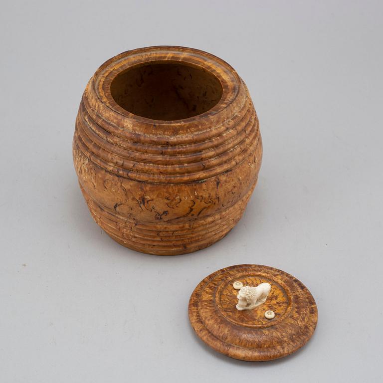 A 19th century birch tobacco box.