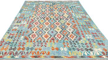A kilim carpet, c 301 x 202 cm.