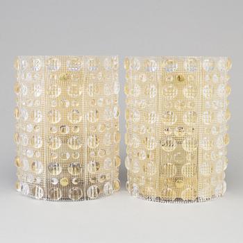 CARL FAGERLUND, a pair of brass and glass wall lights, Orrefors.