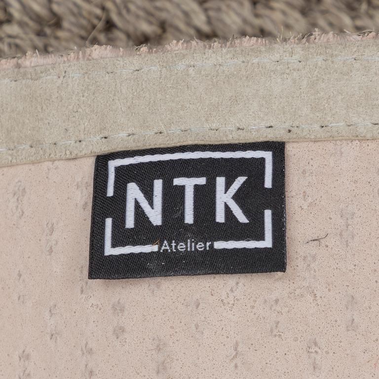 A runner carpet from NTK Atelier, Sweden, c. 448 x 87 cm.