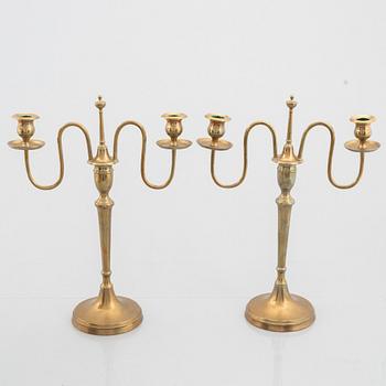 Skultuna Messingsbruk, a pair of 'N 55' brass candelabra, second half of the 19th Century.