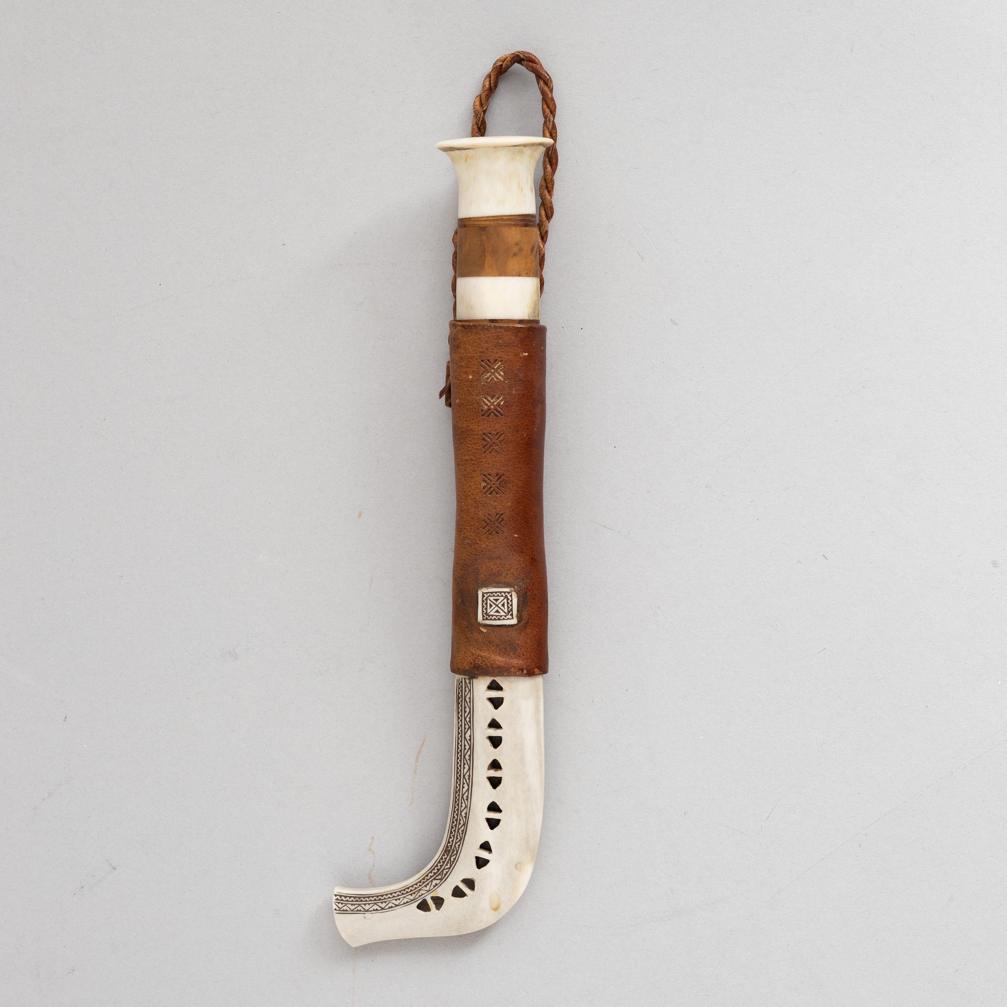 Lars Pirak, a reindeer horn knife, signed.