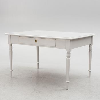 A table, around 1900.