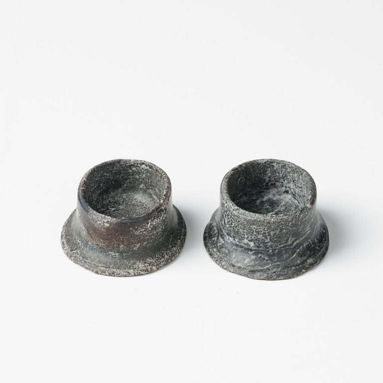 A pair of Swedish Empire 'Kolmård' marble salts, early 19th century.